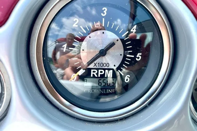 Slide: The Image of Close-up of a 2008 Crownline 250 CR RPM gauge showing 650 RPM. - 21