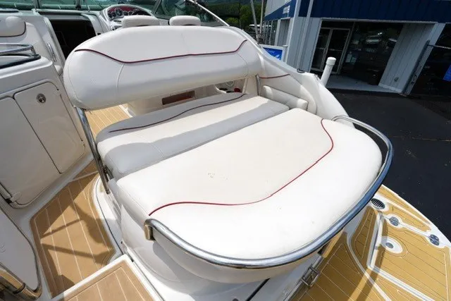 Slide: The Image of 2008 Crownline 250 CR boat with white cushioned seating and sleek design. - 15