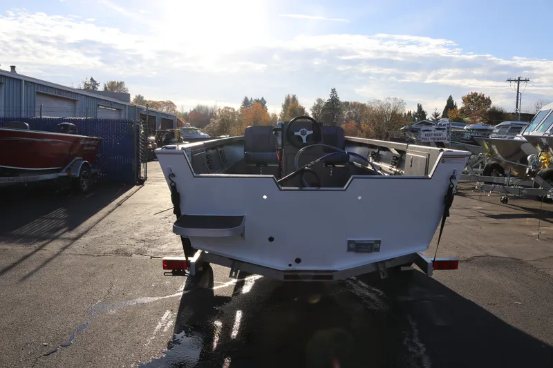 Slide: The Image of 2027 Alumaweld Adventurer 20 boat parked outdoors on a sunny day. - 4
