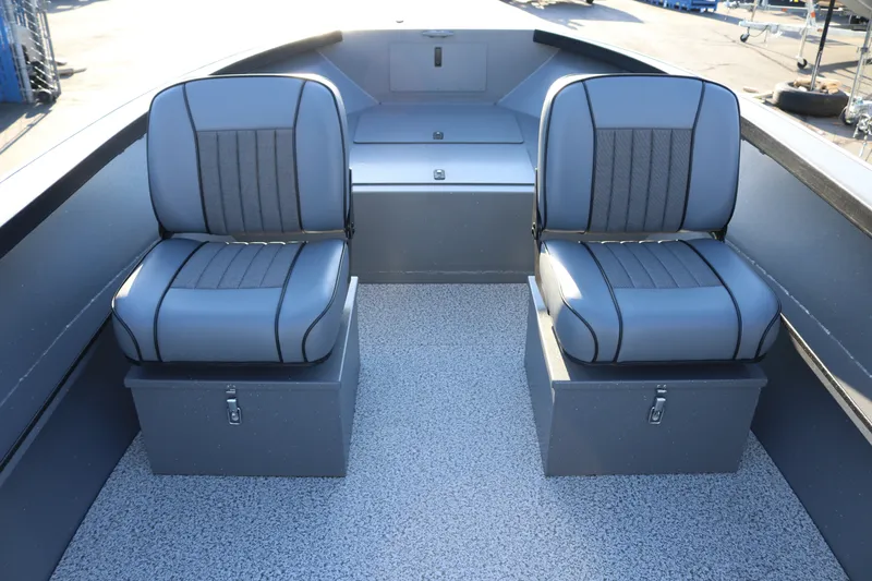 Slide: The Image of 2027 Alumaweld Adventurer 20 boat interior with two gray cushioned seats. - 6