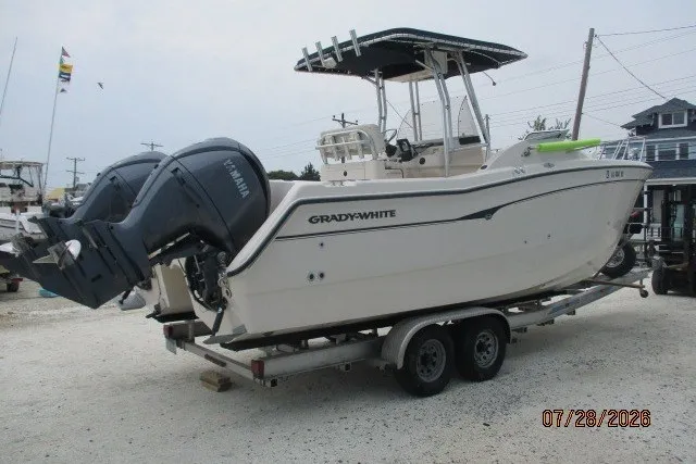Slide: The Image of 2000 Grady-White F-26 Tigercat boat on trailer with dual Yamaha engines. - 17