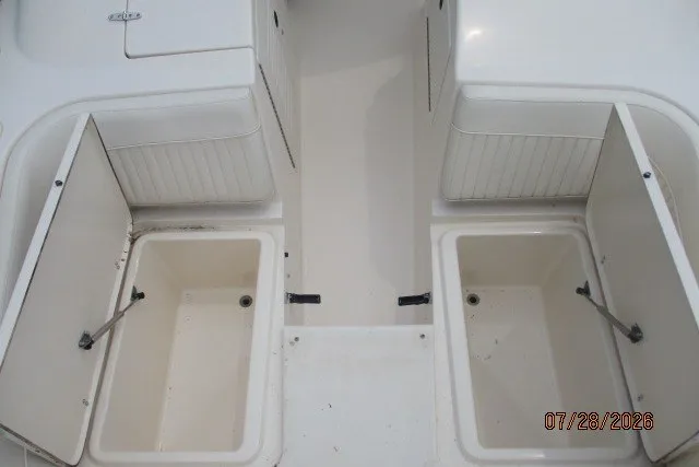 Slide: The Image of Grady-White F-26 Tigercat 2000 boat storage compartments, open and empty. - 45