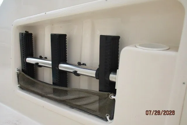 Slide: The Image of Rod holder on 2000 Grady-White F-26 Tigercat boat, with mesh storage pocket. - 53