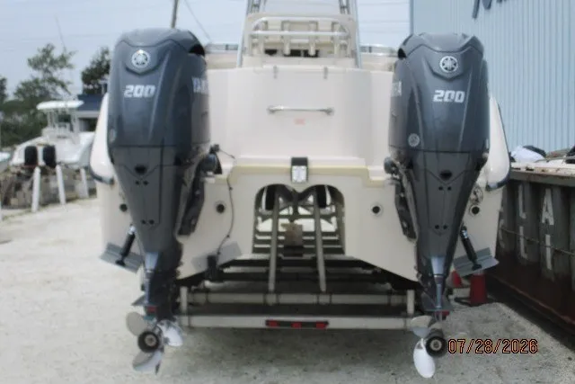 Slide: The Image of 2000 Grady-White F-26 Tigercat boat with dual Yamaha 200 engines, rear view. - 5