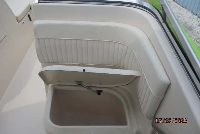 Slide: The Image of Interior seating of 2000 Grady-White F-26 Tigercat boat with storage compartment. - 35