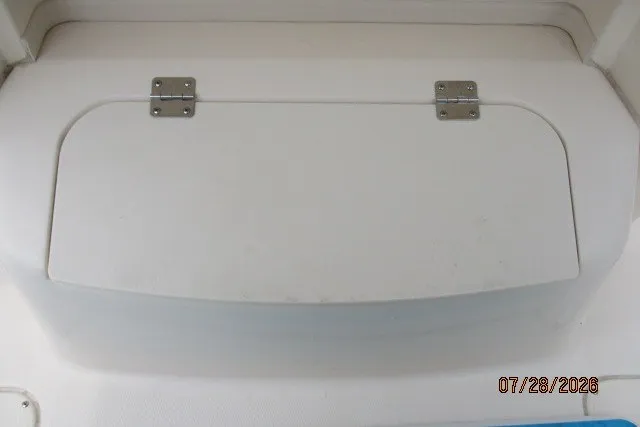 Slide: The Image of Hinged compartment on a 2000 Grady-White F-26 Tigercat boat. - 9