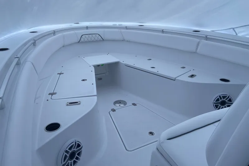 Slide: The Image of 2027 Sportsman Open 262 Center Console boat interior with spacious seating and storage compartments. - 3