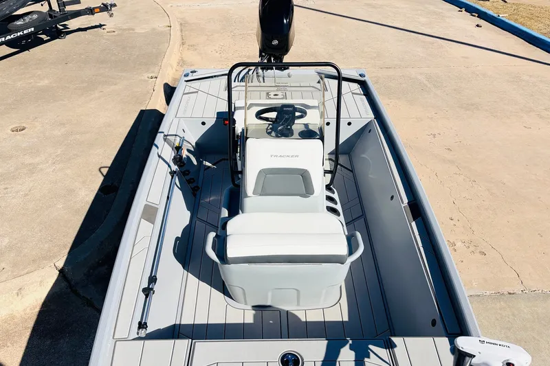 Slide: The Image of 2027 Tracker Bass Tracker Classic CC boat with sleek interior design and modern controls. - 15