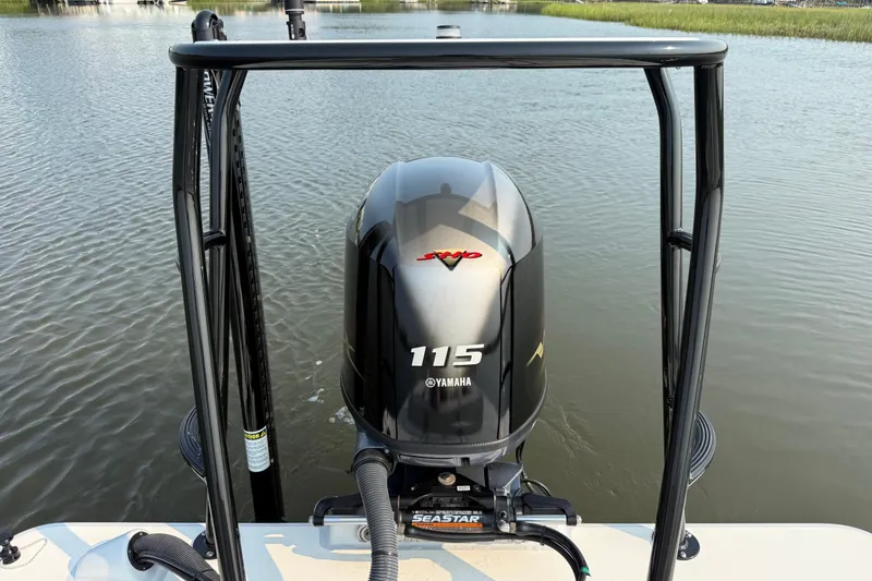 Slide: The Image of 2020 Maverick 18 HPX-V boat with Yamaha 115 engine on calm water. - 17