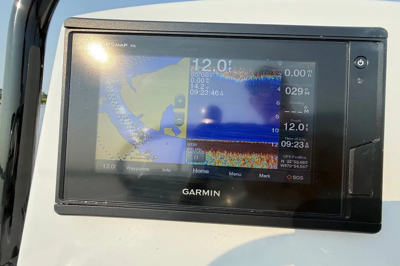 Slide: The Image of Garmin GPS display on 2020 Maverick 18 HPX-V boat, showing navigation and depth data. - 37