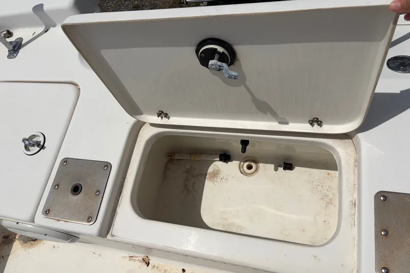 Slide: The Image of Open storage compartment on a 2008 Blazer Bay 1960 Bay boat. - 10