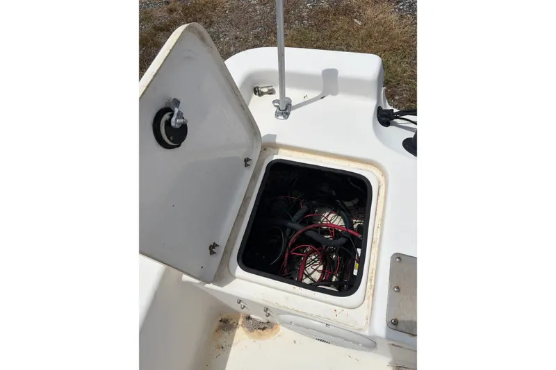 Slide: The Image of Open hatch on 2008 Blazer Bay 1960 Bay boat showing wiring compartment. - 11