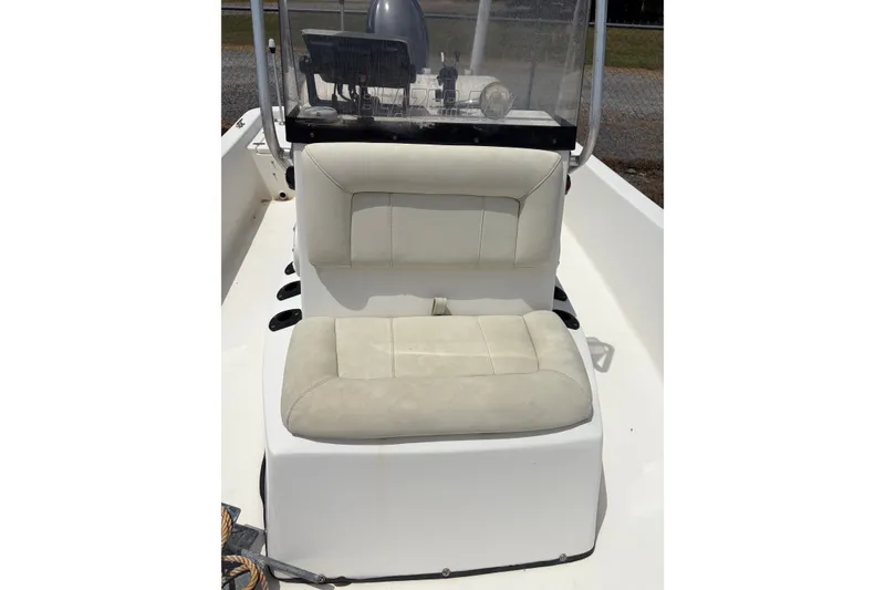 Slide: The Image of 2008 Blazer Bay 1960 Bay boat interior with cushioned seating and console. - 4