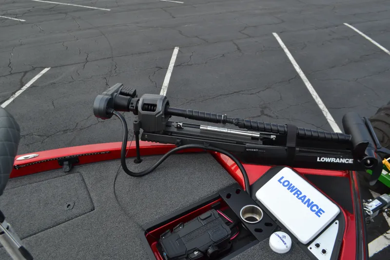 Slide: The Image of 2021 Caymas CX 19 boat with Lowrance equipment in a parking lot. - 10