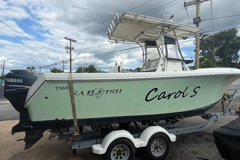 Slide: The Image of 2007 Sailfish 2360 CC boat named "Carol S" on trailer with Yamaha engine. - 1