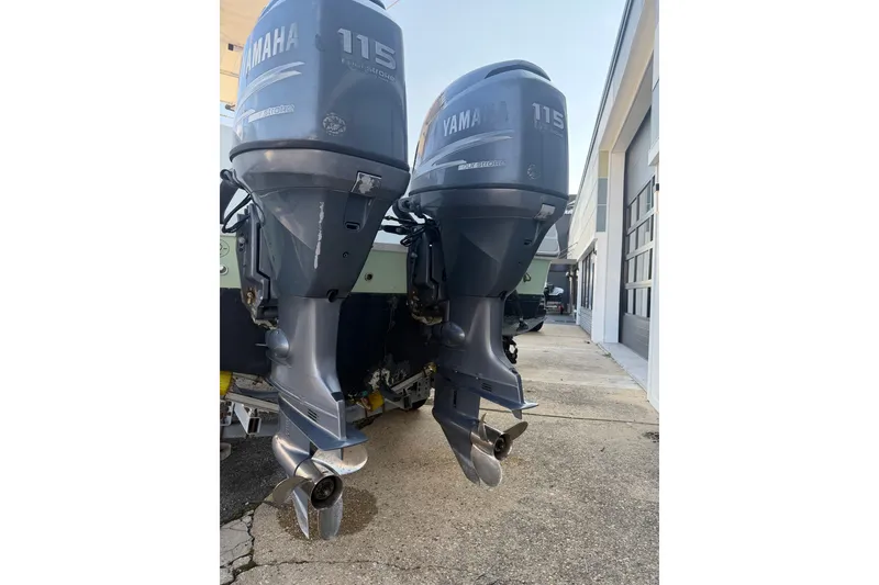 Slide: The Image of Twin Yamaha 115 outboard motors on a 2007 Sailfish 2360 CC boat. - 3