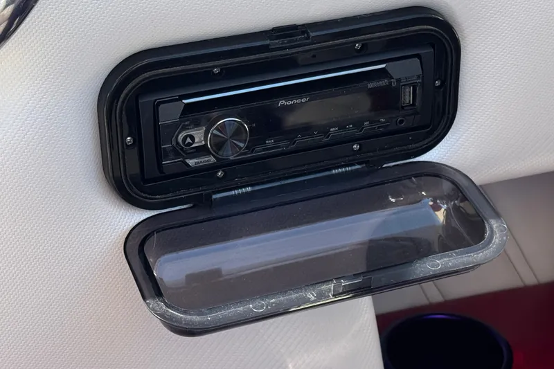 Slide: The Image of Pioneer stereo system in a 2005 Ultimate Warlock 25 World Class boat. - 21