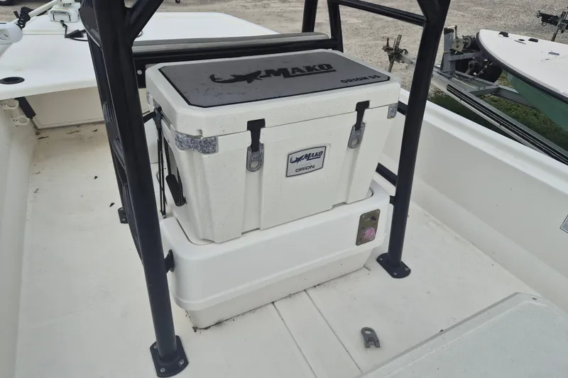 Slide: The Image of 2018 Mako Pro Skiff 19 CC Top Drive with Mako Orion cooler on deck. - 9