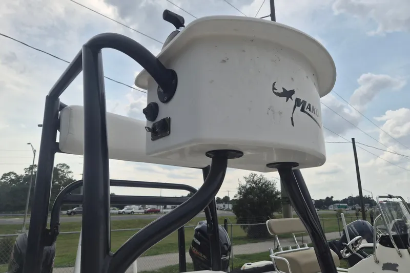 Slide: The Image of 2018 Mako Pro Skiff 19 CC Top Drive boat with elevated helm station. - 13