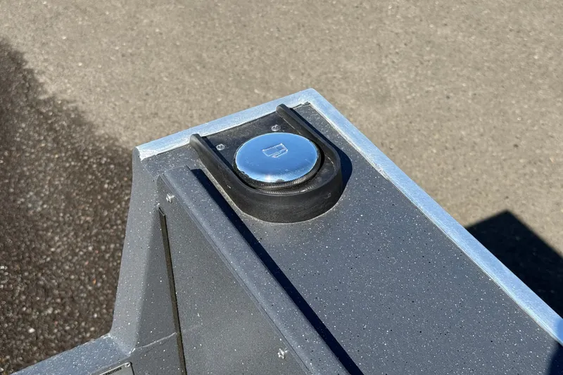 Slide: The Image of Fuel cap on 2027 Alumaweld Adventurer 22 boat, close-up view. - 19