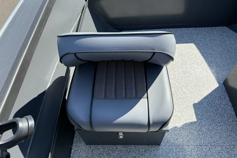 Slide: The Image of 2027 Alumaweld Adventurer 22 boat seat with sleek gray upholstery and textured flooring. - 10