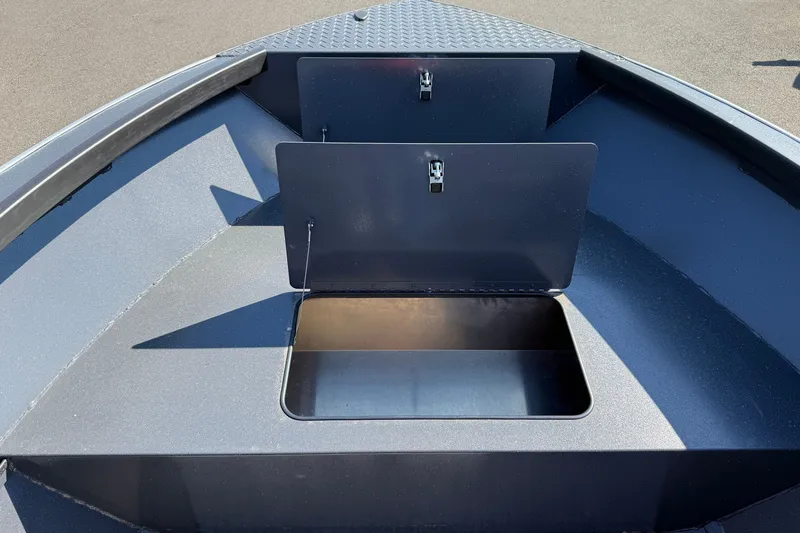 Slide: The Image of Alumaweld Adventurer 22 (2027) boat storage compartment with open hatch. - 13