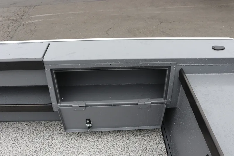 Slide: The Image of Storage compartment on 2027 Alumaweld Super Vee Pro 23 boat, featuring sleek gray design. - 23