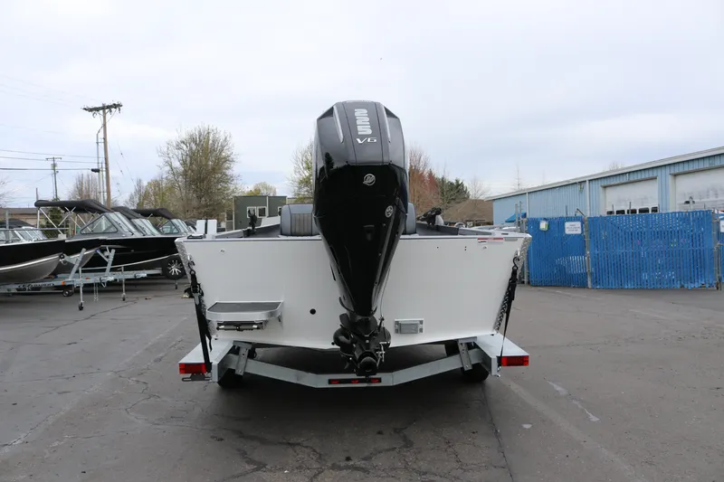 Slide: The Image of 2027 Alumaweld Super Vee Pro 23 boat on trailer, rear view in outdoor setting. - 3