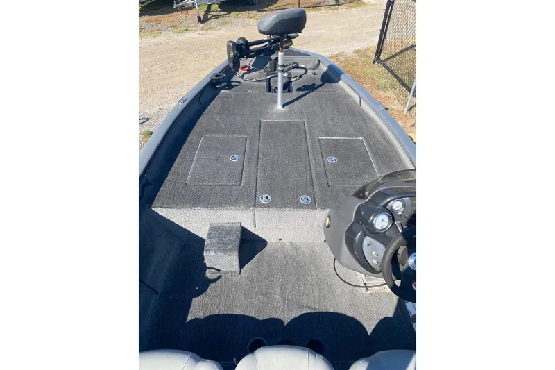 Slide: The Image of 2018 Bass Tracker Pro 19 boat interior with steering console and seating. - 5