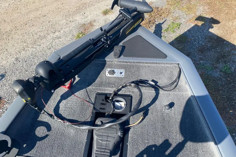 Slide: The Image of 2018 Bass Tracker Pro 19 boat deck with trolling motor and control panel. - 9