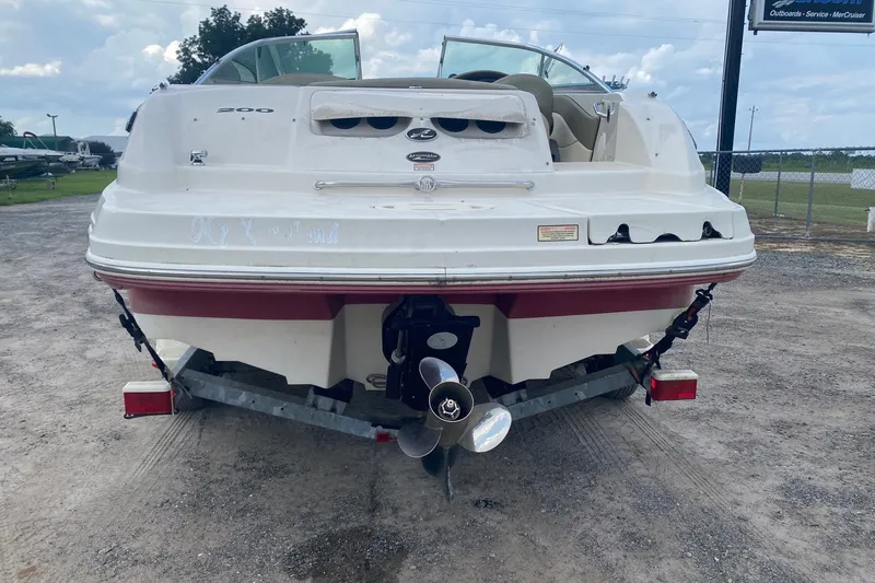 Slide: The Image of 2005 Sea Ray 200 Sundeck boat on trailer, rear view, outdoors. - 1