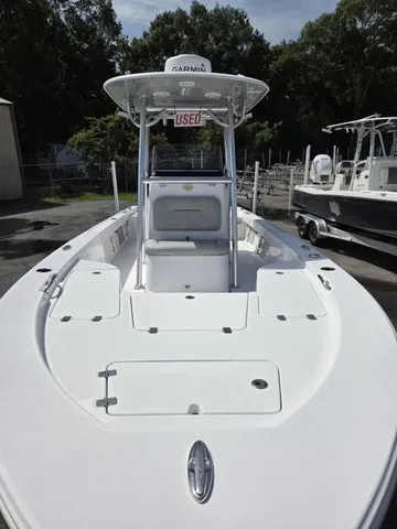 Slide: The Image of A white 2020 Sportsman Masters 247 Bay Boat is on a trailer outdoors. - 7