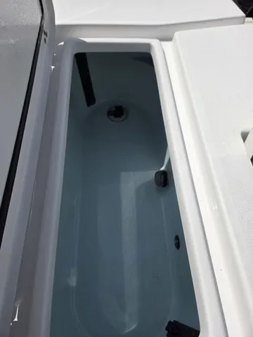 Slide: The Image of An open storage compartment on a 2020 Sportsman Masters 247 Bay Boat. - 27