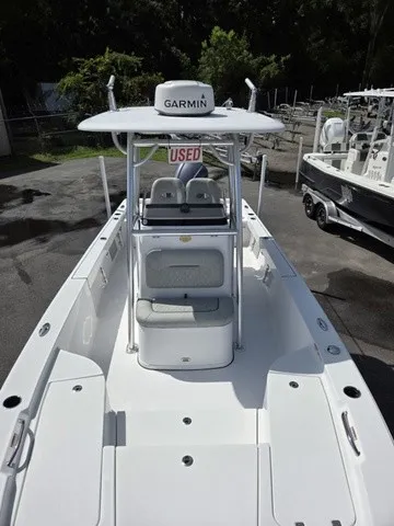 Slide: The Image of A 2020 Sportsman Masters 247 Bay Boat with Garmin equipment and a "Used" sign. - 8