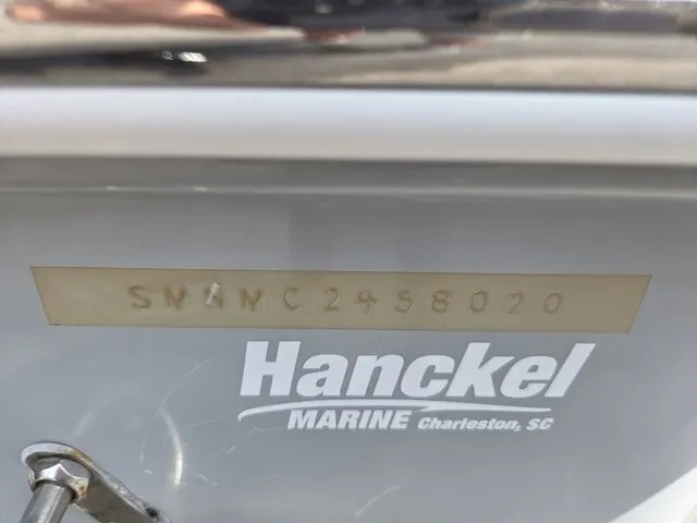 Slide: The Image of Close-up of a boat name and serial number on a 2020 Sportsman Masters 247 Bay Boat. - 30