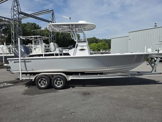 Slide: The Image of A 2020 Sportsman Masters 247 Bay Boat on a trailer, parked on a paved lot. - 3