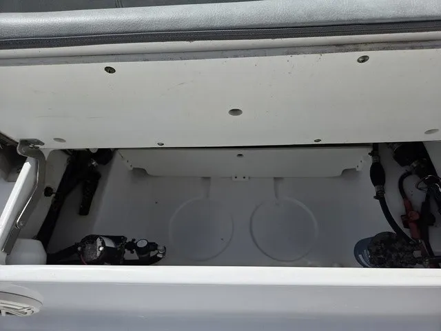 Slide: The Image of An open storage compartment inside a 2020 Sportsman Masters 247 Bay Boat. - 25