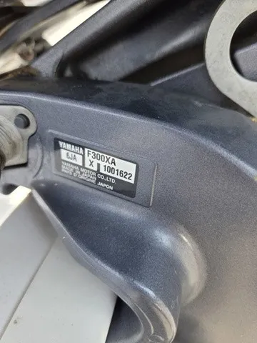 Slide: The Image of Close-up of a Yamaha F300XA outboard motor on a Sportsman Masters 247 Bay Boat. - 29