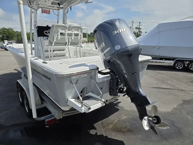 Slide: The Image of A 2020 Sportsman Masters 247 Bay Boat with a Yamaha 300 outboard motor on a trailer. - 5