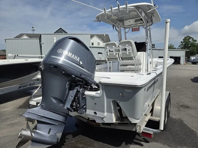 Slide: The Image of A 2020 Sportsman Masters 247 Bay Boat with a Yamaha outboard motor, parked on a trailer. - 4
