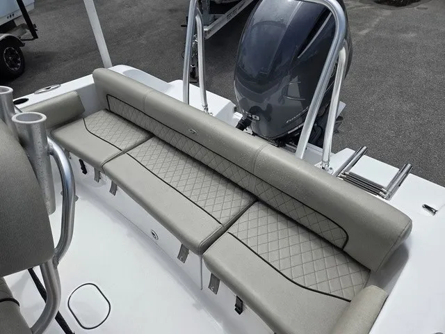 Slide: The Image of The 2021 Sportsman Heritage 211 Center Console features a cushioned bench seat with diamond stitching. - 20