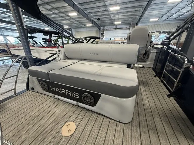 Slide: The Image of The image shows the interior of a 2021 Harris Solstice 250 SLDH with gray upholstery. - 28