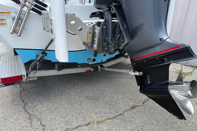 Slide: The Image of Rear view of 2021 Express X23 BAY boat with Yamaha outboard motor. - 4