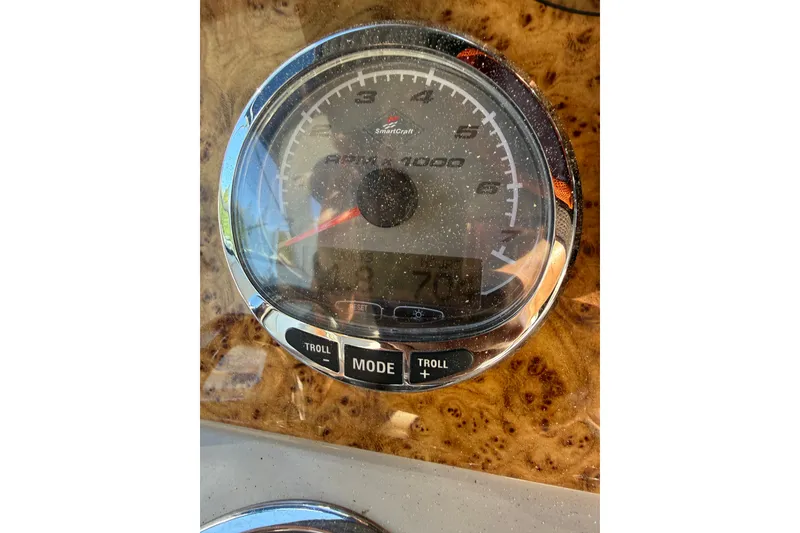 Slide: The Image of Close-up of a 2008 Formula 310 Sun Sport speedometer with wood grain dashboard. - 17