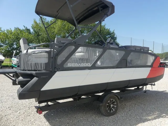 Slide: The Image of A 2023 Sea-Doo Switch Sport 21 on a trailer, featuring a modern design with gray accents. - 3
