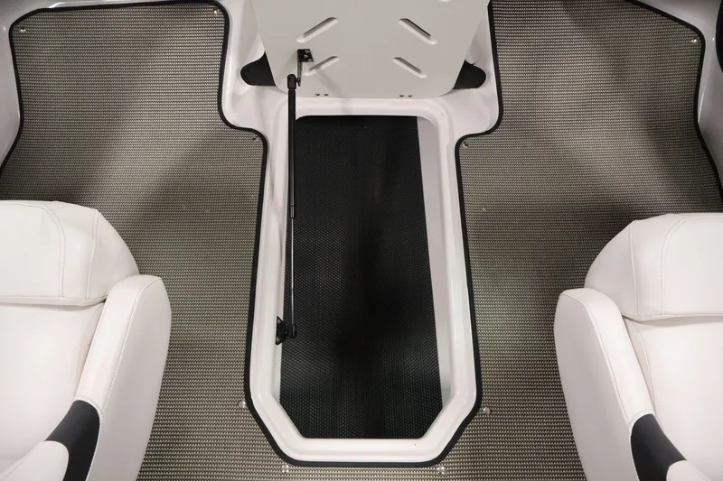 Slide: The Image of Interior view of 2017 Four Winns H190 boat with open storage compartment. - 35