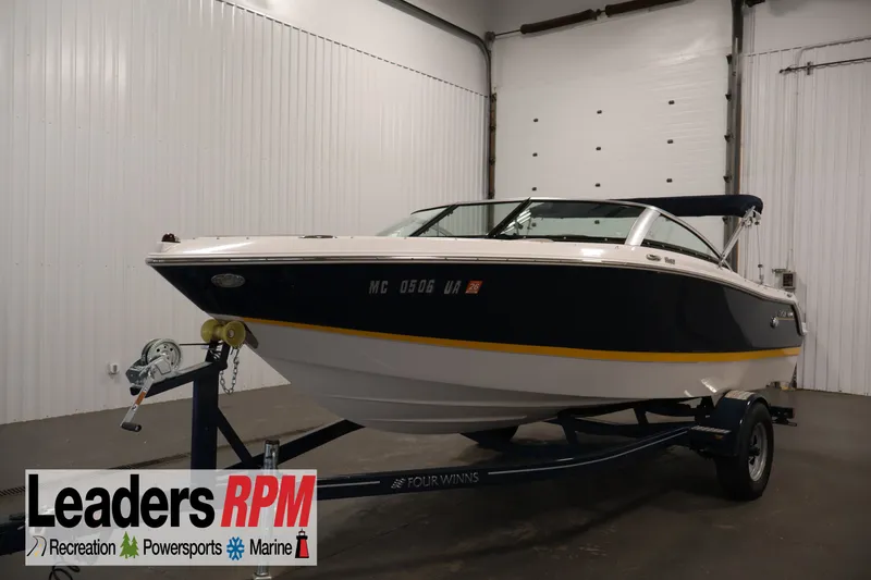 The Image of 2017 Four Winns H190 boat on trailer in indoor showroom. - 1