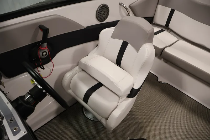 Slide: The Image of Interior of 2017 Four Winns H190 boat with steering wheel and cushioned seating. - 28