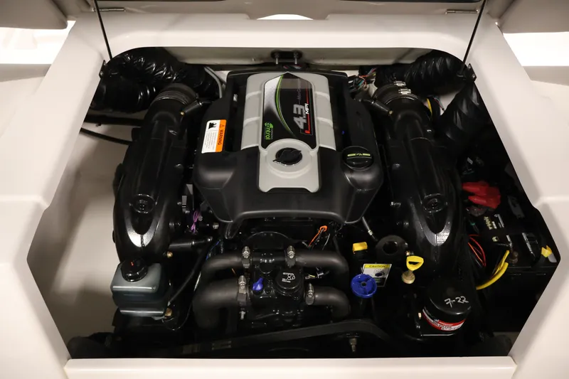 Slide: The Image of Engine compartment of a 2017 Four Winns H190 boat, showcasing a 4.3L MPI engine. - 40