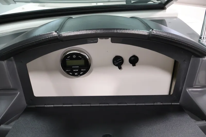 Slide: The Image of Dashboard of 2017 Four Winns H190 boat featuring audio controls and sleek design. - 30